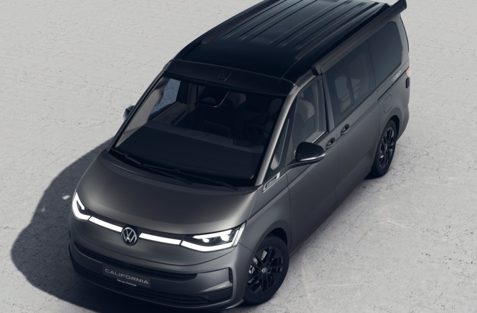 Top three-quarter view showing the black pop-top roof